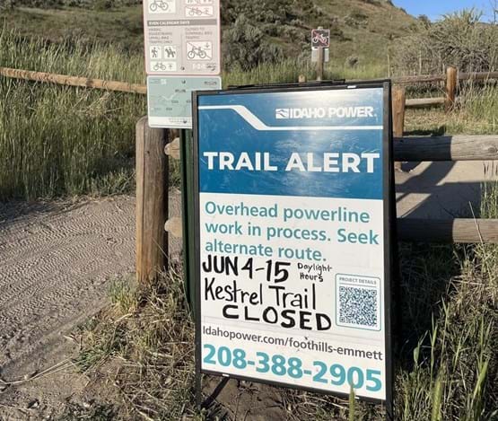 Kestrel Trail closed sign during the day.